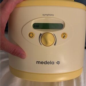 Medela Breast Pump Unit in Cream and Yellow